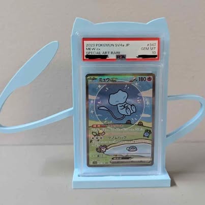 Blue Bubble Mew stand holding a graded Pokémon card