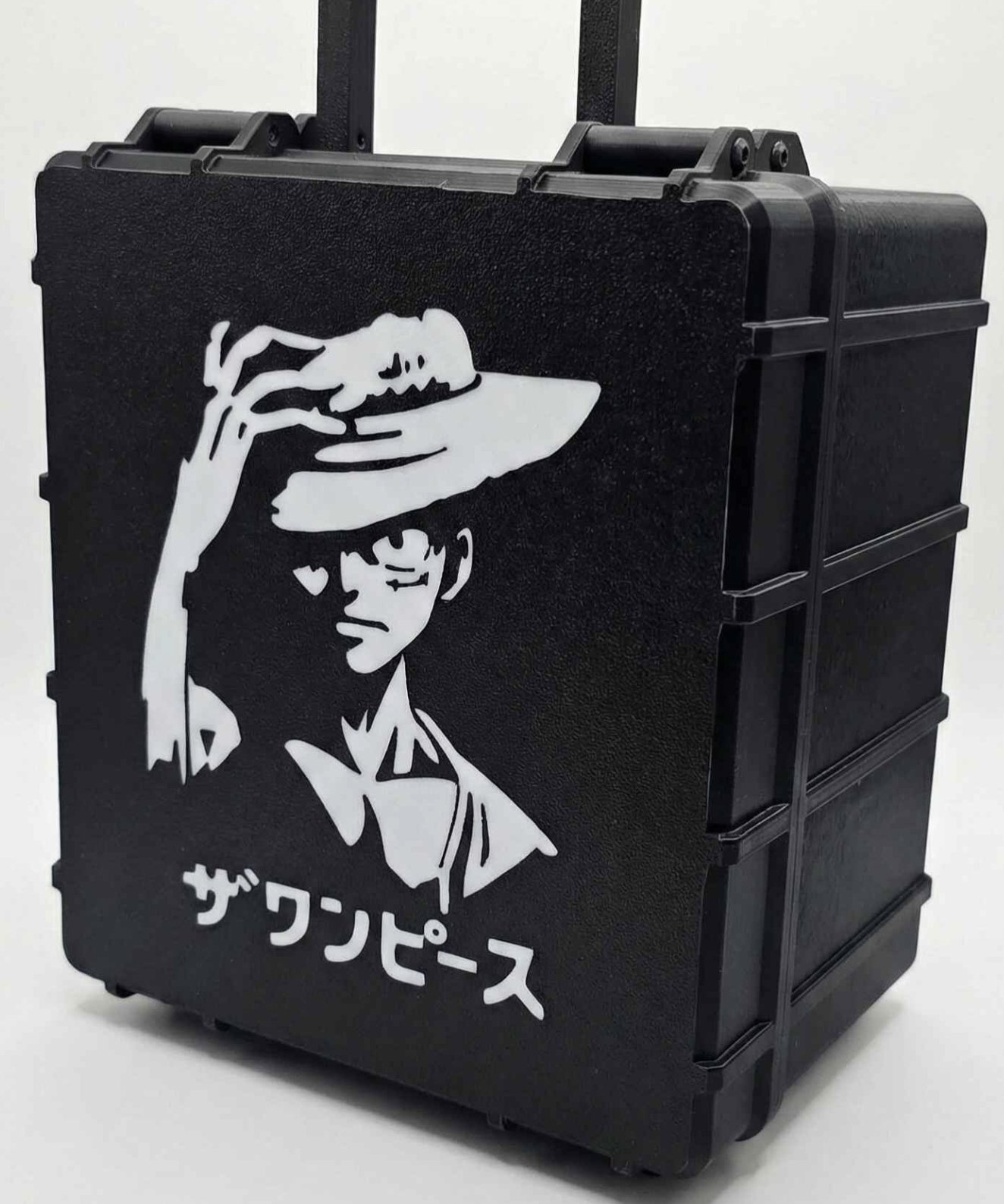 Black custom card case with white straw-hat character silhouette and Japanese text