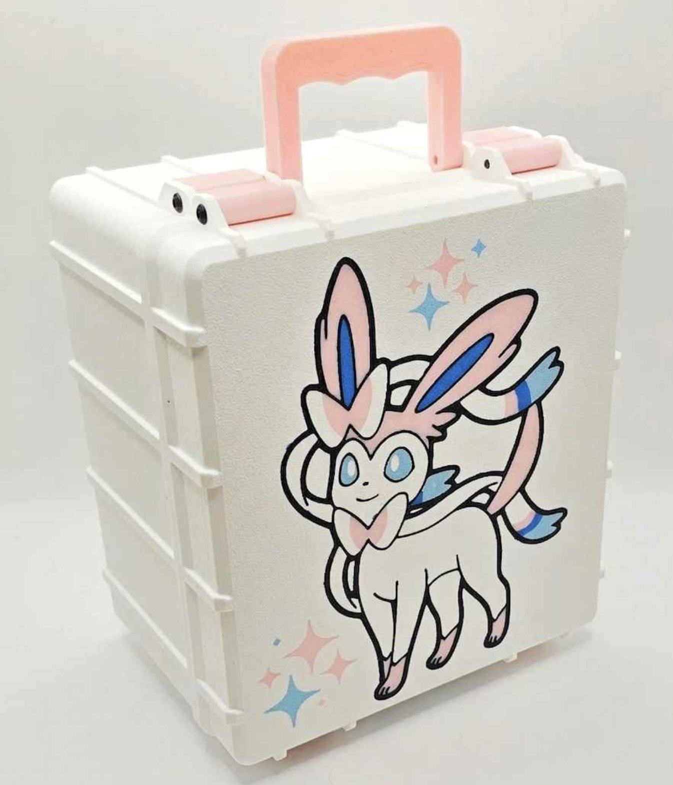White custom card case with pink handle and Sylveon artwork